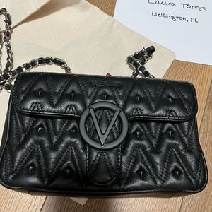 Mario Valentino rock stud handbag
